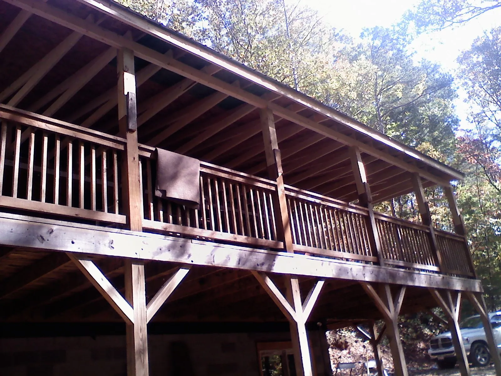 Timber framing under a new elevated porch and deck — Roof Leak Repair in Fryeburg by Roofing Brothers